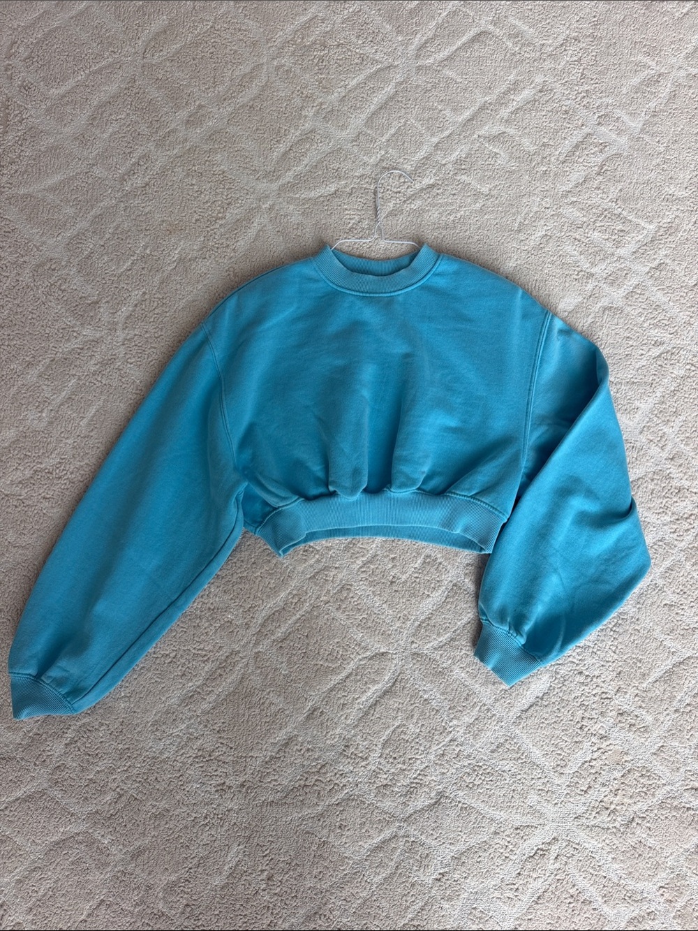 Divided Bright Turquoise Cropped Sweatshirt